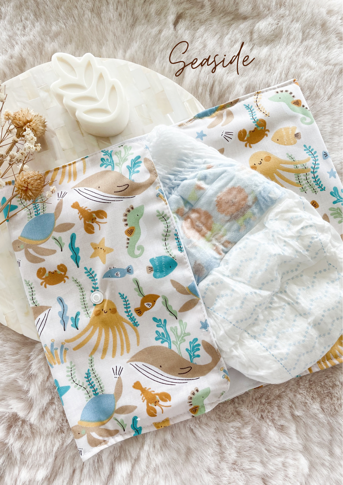 Pochette à couches et lingettes nomade