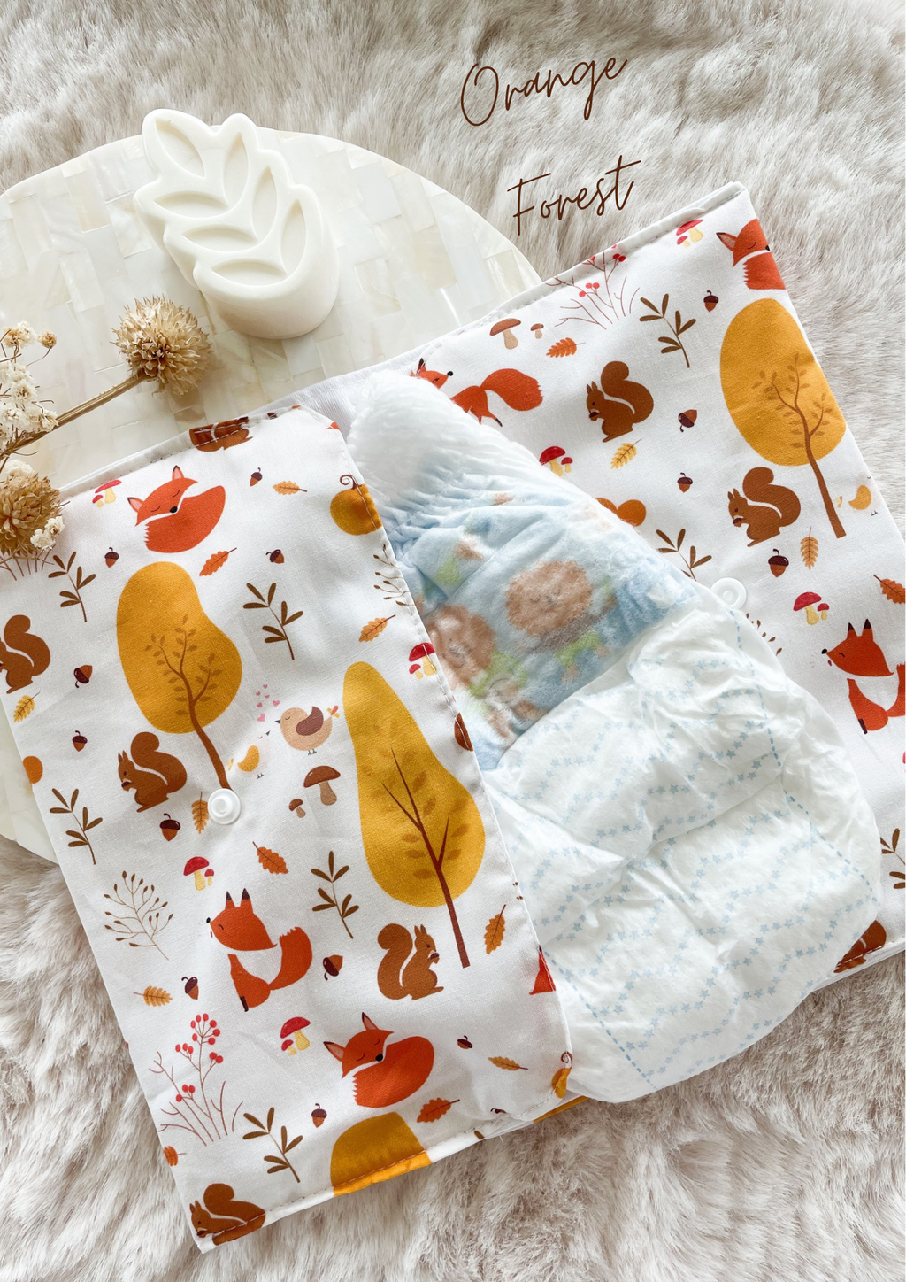 Pochette à couches et lingettes nomade